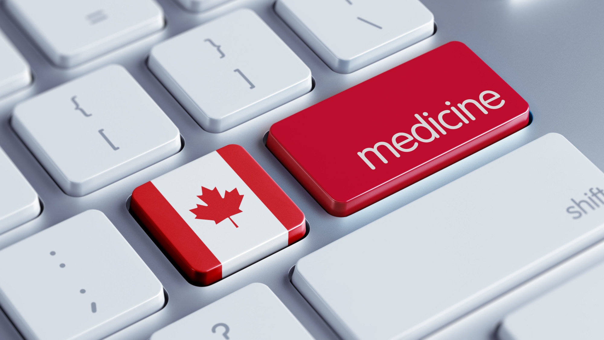 canadian flag and medicine buttons on keyboard