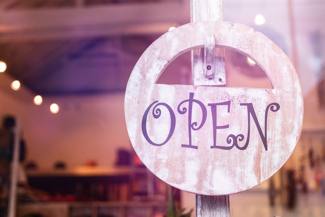 open sign on small business window