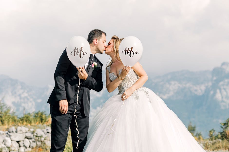 married couple with balloons