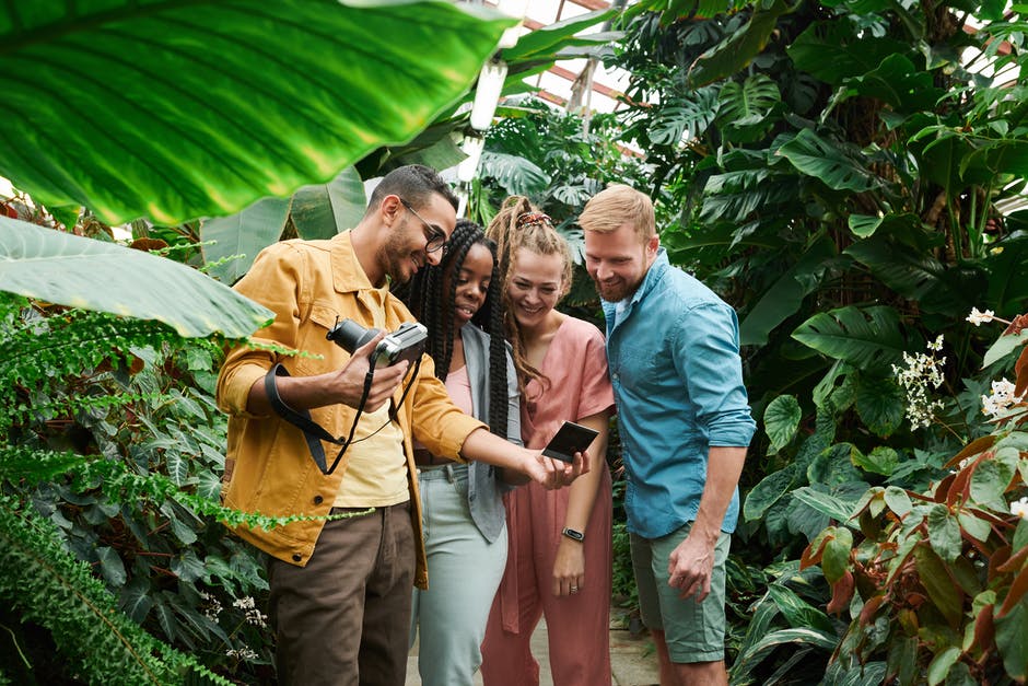 People Taking a Group Selfie